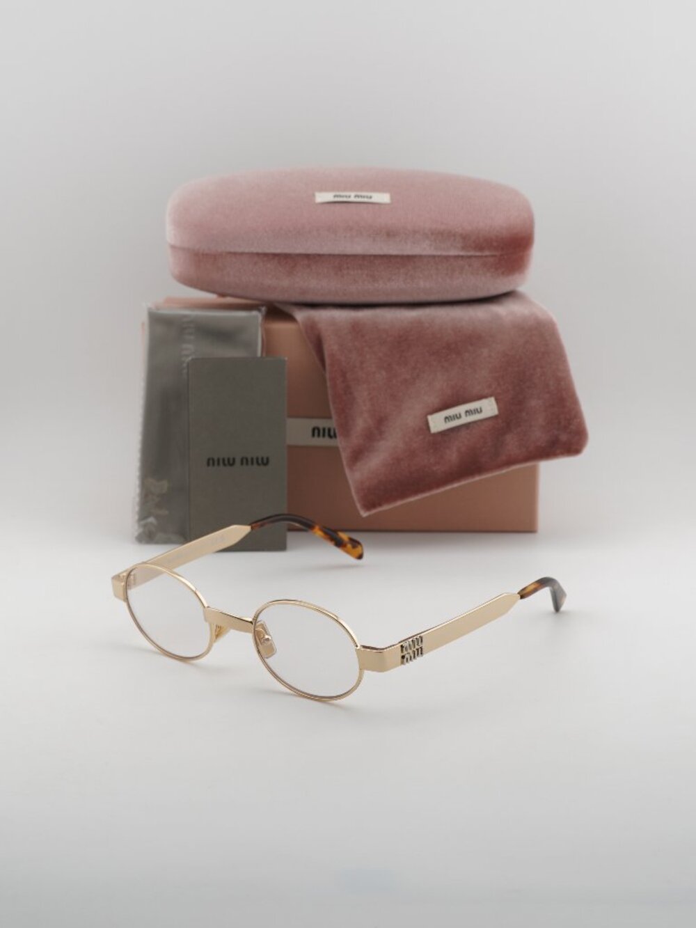 Miu Miu MUB51S 5AK10W Oval Sunglasses – Gold\ Clear